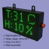 Wall-mounted digital temperature and humidity monitor with red LED display by Adisans