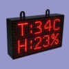 Wall-mounted digital temperature and humidity monitor with red LED display by Adisans