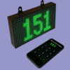 Wireless token remote showing a green LED screen with token number for queue management.